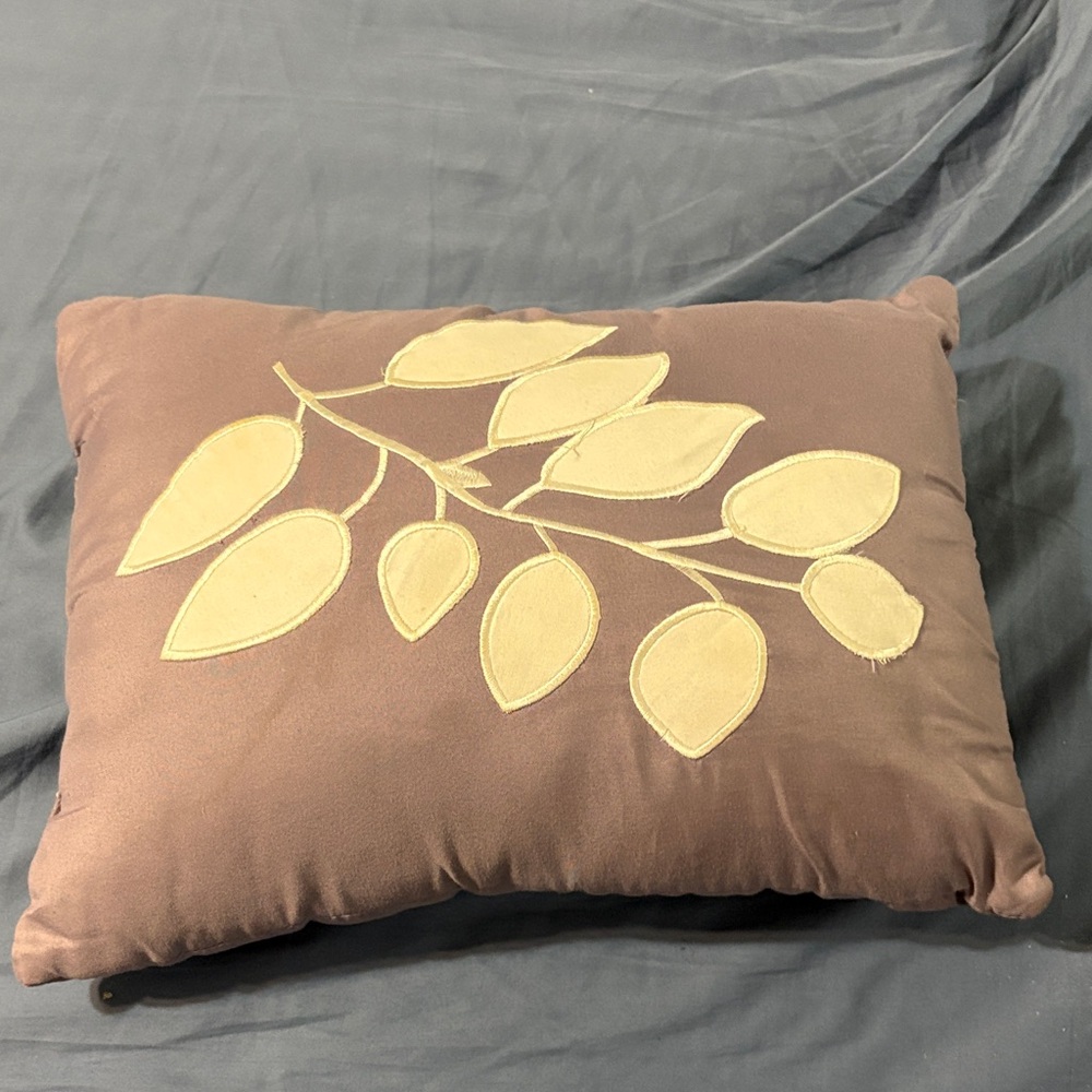 Mauve Pillow with Leaf Design 14/10 one stain. Loose string